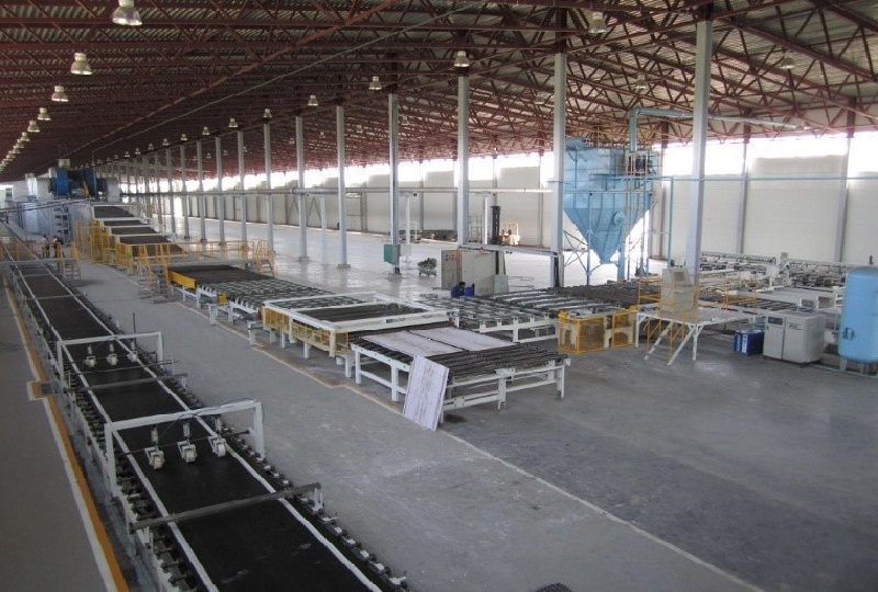 Gypsum tile production